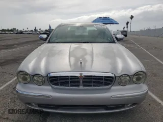 2004 Jaguar XJ Vanden Plas with VIN SAJWA74C04SG25291, listed as a Copart auction lot 56678255 with 176,597 mi miles and Clean Title. Bid and sale history available at DreamBid. Image 5.
