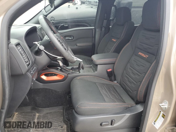 2024 Nissan Frontier SL with VIN 1N6ED1EJ4RN657334, listed as a Copart auction lot 55169675 with 5,706 mi miles and Salvage title. Bid and sale history available at DreamBid. Image 7.