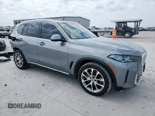 2024 BMW X5 xDrive40i with VIN 5UX23EU09R9T07066, listed as a Copart auction lot 61271495 with 18,042 mi miles and Salvage title. Bid and sale history available at DreamBid. Image 4.