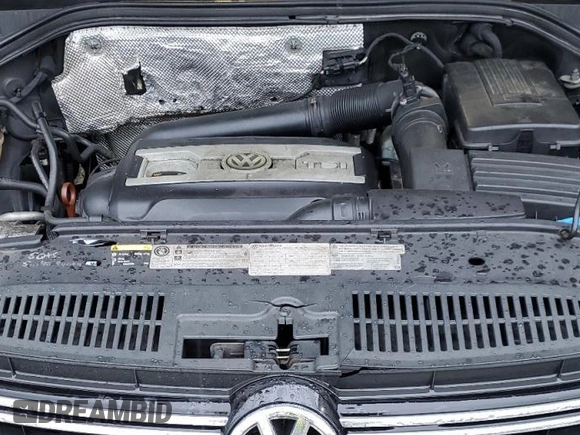 2013 Volkswagen Tiguan SE z VIN WVGBV7AX3DW544490, wystawiony jako Copart lot #52632675 z przebiegiem 149 170 mil mil oraz Czysty tytuł • Clean title. Historia ofert i sprzedaży dostępna na DreamBid. Obrazek 12.