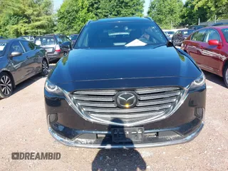 2018 Mazda CX-9 Grand Touring with VIN JM3TCBDYXJ0208962, listed as a IAAI auction lot 42629720 with 123,929 mi miles and . Bid and sale history available at DreamBid. Image 13.