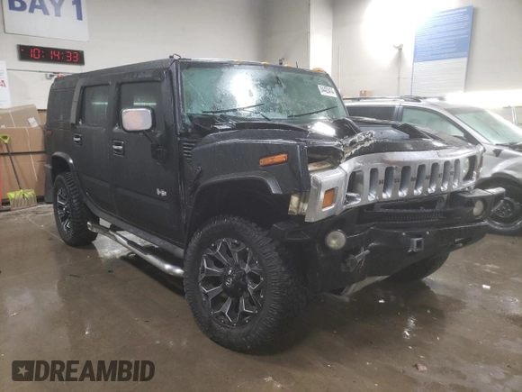 2003 Hummer H2 with VIN 5GRGN23U33H143023, listed as a Copart auction lot 84403414 with 0 mi miles and Salvage Title. Bid and sale history available at carsss.com. Image 4.