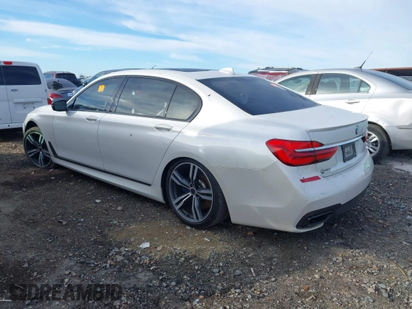 2017 BMW 7 Series 750i with VIN WBA7F0C58HGM21467, listed as a IAAI auction lot 41632663 with 136,620 mi miles. Bid and sale history available at carsss.com. Image 3.