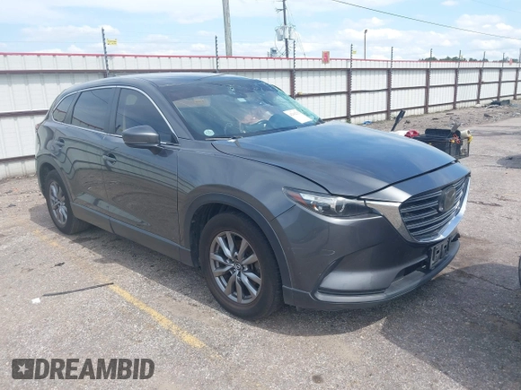 2019 Mazda CX-9 Sport with VIN JM3TCABY0K0327361, listed as a IAAI auction lot 42362232 with 264,699 mi miles and . Bid and sale history available at DreamBid. Image 1.