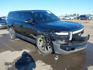 2024 Rivian R1S Adventure z VIN 7PDSGABA8RN039833, wystawiony jako IAAI lot #41867083 z przebiegiem Nie podano mil oraz . Historia ofert i sprzedaży dostępna na DreamBid. Obrazek 1.
