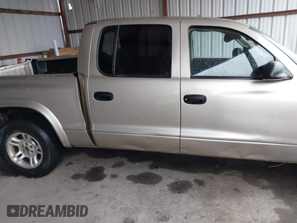 2003 Dodge Dakota SLT with VIN 1D7HL48N93S303911, listed as a IAAI auction lot 41536555 with 383,306 mi miles. Bid and sale history available at carsss.com. Image 20.