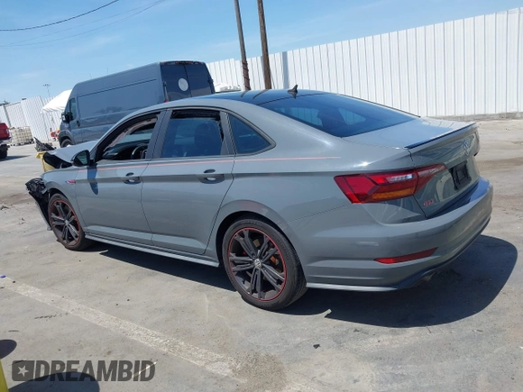 2019 Volkswagen Jetta GLI S z VIN 3VW6T7BU9KM153175, wystawiony jako IAAI lot #42099719 z przebiegiem 90 608 mil mil oraz . Historia ofert i sprzedaży dostępna na DreamBid. Obrazek 14.