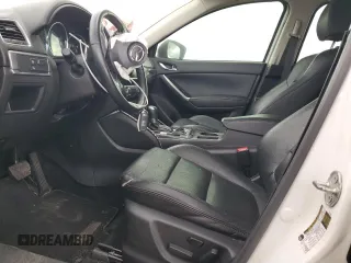 2016 Mazda CX-5 Grand Touring with VIN JM3KE2DYXG0784971, listed as a Copart auction lot 43865605 with 146,025 mi miles and Salvage Title. Bid and sale history available at carsss.com. Image 7.