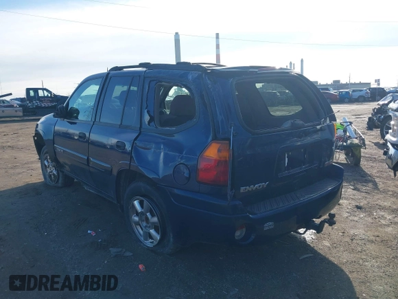 2004 GMC Envoy SLE z VIN 1GKDS13S842152119, wystawiony jako IAAI lot #41187115 z przebiegiem 194 304 mil mil oraz . Historia ofert i sprzedaży dostępna na DreamBid. Obrazek 3.