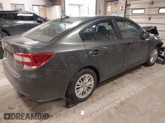 2018 Subaru Impreza Premium z VIN 4S3GKAD67J3619711, wystawiony jako IAAI lot #41475064 z przebiegiem 58 818 mil mil oraz . Historia ofert i sprzedaży dostępna na DreamBid. Obrazek 4.