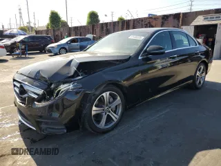 2020 Mercedes-Benz E 350 with VIN W1KZF8DB7LA819690, listed as a Copart auction lot 61456535 with 68,750 mi miles and Salvage title. Bid and sale history available at DreamBid. Image 1.