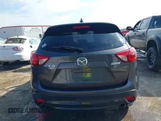 2016 Mazda CX-5 Touring with VIN JM3KE4CY3G0672977, listed as a IAAI auction lot 41889137 with 130,593 mi miles. Bid and sale history available at carsss.com. Image 17.