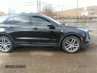 2021 Cadillac XT4 AWD Sport with VIN 1GYFZFR48MF009552, listed as a IAAI auction lot 41743125 with 53,982 mi miles and . Bid and sale history available at DreamBid. Image 13.