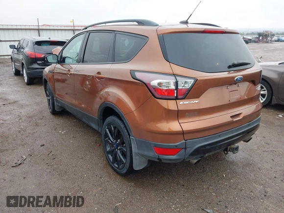 2017 Ford Escape Titanium with VIN 1FMCU9J99HUB75687, listed as a IAAI auction lot 41180789 with 108,967 mi miles. Bid and sale history available at carsss.com. Image 3.