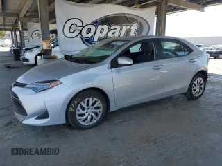 2019 Toyota Corolla L with VIN 2T1BURHE2KC237793, listed as a Copart auction lot 63261205 with 66,827 mi miles and Salvage title. Bid and sale history available at DreamBid. Image 1.