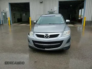 2012 Mazda CX-9 Touring z VIN JM3TB3CV5C0347593, wystawiony jako Copart lot #55675705 z przebiegiem 179 777 mil mil oraz Szkody całkowita. Historia ofert i sprzedaży dostępna na DreamBid. Obrazek 14.
