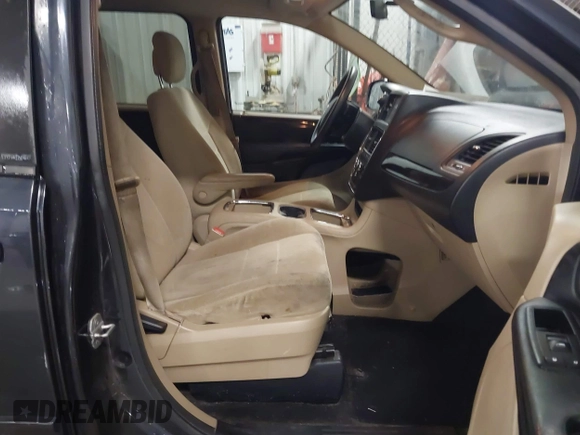 2014 Dodge Grand Caravan SXT with VIN 2C4RDGCGXER154709, listed as a IAAI auction lot 41117603 with 214,872 mi miles and . Bid and sale history available at DreamBid. Image 5.