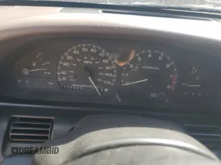 1991 Nissan 240SX z VIN JN1MS34PXMW001053, wystawiony jako Copart lot #79007744 z przebiegiem 172 425 mil mil oraz Nie do naprawy. Historia ofert i sprzedaży dostępna na DreamBid. Obrazek 9.