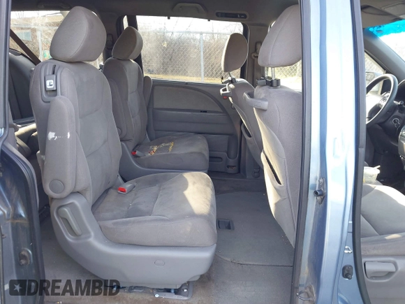 2010 Honda Odyssey EX z VIN 5FNRL3H46AB059211, wystawiony jako IAAI lot #41504573 z przebiegiem 217 415 mil mil oraz . Historia ofert i sprzedaży dostępna na DreamBid. Obrazek 8.