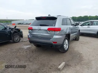 2017 Jeep Grand Cherokee Laredo with VIN 1C4RJFAG3HC963309, listed as a IAAI auction lot 42501394 with 145,315 mi miles and . Bid and sale history available at DreamBid. Image 4.