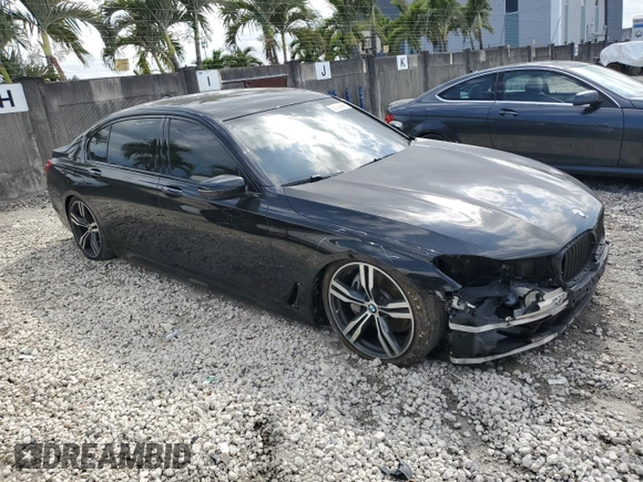 2017 BMW 7 Series 740i with VIN WBA7E2C34HG741026, listed as a Copart auction lot 52792995 with 91,462 mi miles and Salvage Title. Bid and sale history available at carsss.com. Image 4.