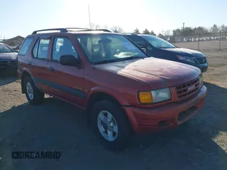 1999 Isuzu Rodeo S with VIN 4S2CM58W6X4336332, listed as a IAAI auction lot 41758338 with 183,983 mi miles. Bid and sale history available at carsss.com. Image 1.