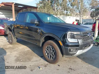 2024 Ford Ranger XLT with VIN 1FTER4GH0RLE22652, listed as a IAAI auction lot 41400573 with 7,823 mi miles. Bid and sale history available at carsss.com. Image 1.