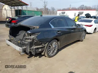 2018 Infiniti Q50 2.0t LUXE with VIN JN1CV7AR1JM280514, listed as a IAAI auction lot 41795656 with 82,496 mi miles. Bid and sale history available at carsss.com. Image 4.