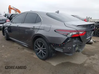 2022 Toyota Camry SE with VIN 4T1G11AK2NU674888, listed as a IAAI auction lot 41883188 with 41,566 mi miles and . Bid and sale history available at DreamBid. Image 3.