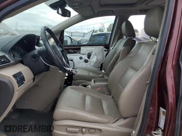 2016 Honda Odyssey Touring Elite with VIN 5FNRL5H96GB125546, listed as a Copart auction lot 54954165 with 101,479 mi miles and Salvage Title. Bid and sale history available at DreamBid. Image 7.