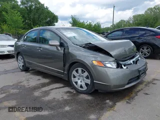 2006 Honda Civic LX with VIN 1HGFA16566L137307, listed as a IAAI auction lot 42166545 with 241,384 mi miles and . Bid and sale history available at DreamBid. Image 1.