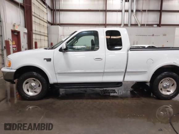 1998 Ford F-150 с VIN 1FTRX18L1WKB99239, выставлен на аукционе IAAI как лот 41987823 с пробегом 217 930 миль миль и . История ставок и продаж доступна на DreamBid. Изображение 14.