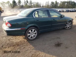 2004 Jaguar X-Type z VIN SAJEA51C04WD65097, wystawiony jako Copart lot #53825295 z przebiegiem 58 270 mil mil oraz Szkoda całkowita • Salvage title. Historia ofert i sprzedaży dostępna na DreamBid. Obrazek 3.