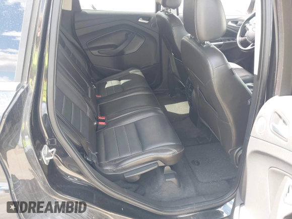 2014 Ford Escape Titanium with VIN 1FMCU9JX2EUB66579, listed as a IAAI auction lot 42171374 with 131,485 mi miles. Bid and sale history available at carsss.com. Image 8.