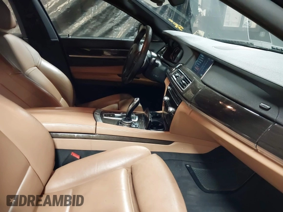 2014 BMW 7 Series ALPINA B7 xDrive with VIN WBAYF8C53ED141858, listed as a IAAI auction lot 40987098 with 128,404 mi miles and . Bid and sale history available at DreamBid. Image 5.