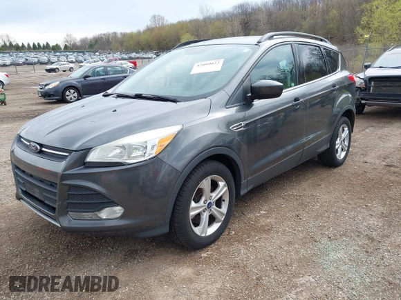 2015 Ford Escape SE with VIN 1FMCU0G97FUA54558, listed as a IAAI auction lot 42099022 with 151,721 mi miles. Bid and sale history available at carsss.com. Image 2.