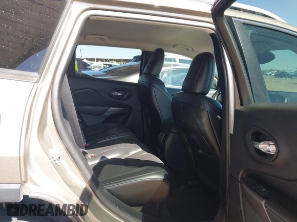 2021 Jeep Cherokee Altitude with VIN 1C4PJLLBXMD155096, listed as a IAAI auction lot 41746319 with 99,423 mi miles and . Bid and sale history available at DreamBid. Image 8.