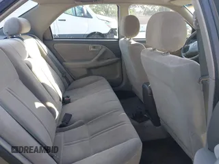 2000 Toyota Camry CE with VIN 4T1BG22K3YU004252, listed as a IAAI auction lot 42130158 with 236,104 mi miles and . Bid and sale history available at carsss.com. Image 8.