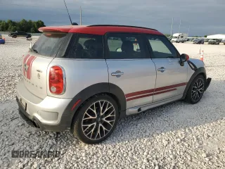2016 MINI Countryman John Cooper Works with VIN WMWXD1C59GWT97602, listed as a Copart auction lot 52898605 with 141,749 mi miles and Salvage Title. Bid and sale history available at DreamBid. Image 3.