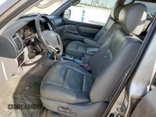2005 Toyota Land Cruiser z VIN JTEHT05J652073327, wystawiony jako Copart lot #59668455 z przebiegiem 145 110 mil mil oraz Czysty tytuł • Clean title. Historia ofert i sprzedaży dostępna na DreamBid. Obrazek 7.