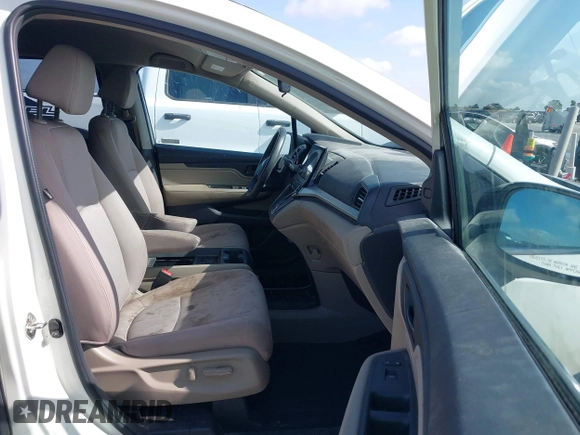 2018 Honda Odyssey EX with VIN 5FNRL6H57JB100035, listed as a IAAI auction lot 42582758 with 88,585 mi miles and . Bid and sale history available at DreamBid. Image 5.