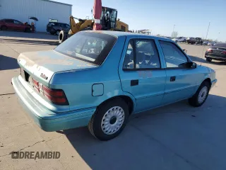 1994 Plymouth Sundance z VIN 1P3AP28K0RN197432, wystawiony jako Copart lot #48218915 z przebiegiem 97 625 mil mil oraz Szkody całkowita. Historia ofert i sprzedaży dostępna na DreamBid. Obrazek 3.