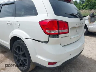 2014 Dodge Journey SXT z VIN 3C4PDCBBXET135001, wystawiony jako IAAI lot #42318360 z przebiegiem 152 321 mil mil oraz . Historia ofert i sprzedaży dostępna na DreamBid. Obrazek 13.