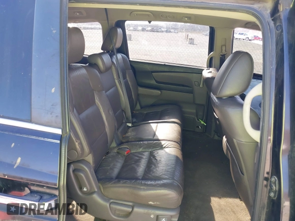 2012 Honda Odyssey EX-L with VIN 5FNRL5H69CB017227, listed as a IAAI auction lot 41345254 with 136,775 mi miles and . Bid and sale history available at carsss.com. Image 8.