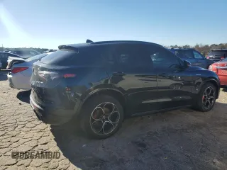 2024 Alfa Romeo Stelvio Ti z VIN ZASPAKBNXR7D70884, wystawiony jako Copart lot #87212794 z przebiegiem 15 162 mil mil oraz Szkoda całkowita • Salvage title. Historia ofert i sprzedaży dostępna na DreamBid. Obrazek 3.