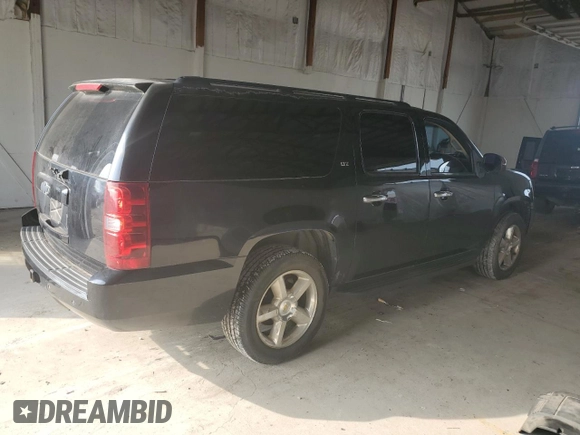 2007 Chevrolet Suburban LTZ with VIN 1GNFK163X7J252250, listed as a Copart auction lot 58479585 with 269,637 mi miles and Clean title. Bid and sale history available at DreamBid. Image 3.