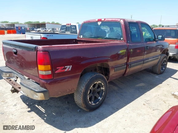1999 Chevrolet Silverado 1500 LT with VIN 2GCEK19T9X1145877, listed as a IAAI auction lot 41985023 with 241,622 mi miles. Bid and sale history available at carsss.com. Image 4.