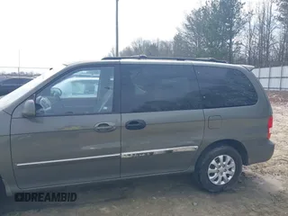 2004 Kia Sedona LX with VIN KNDUP131546543841, listed as a IAAI auction lot 41541012 with 112,122 mi miles. Bid and sale history available at carsss.com. Image 6.