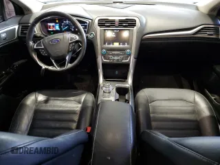 2017 Ford Fusion SE z VIN 3FA6P0H98HR179253, wystawiony jako Copart lot #52015345 z przebiegiem 99 883 mil mil oraz Czysty tytuł • Clean title. Historia ofert i sprzedaży dostępna na DreamBid. Obrazek 8.