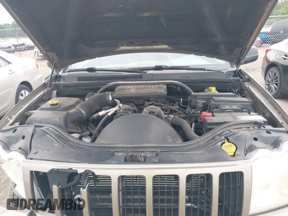 2005 Jeep Grand Cherokee Laredo z VIN 1J4GR48K75C719070, wystawiony jako IAAI lot #42673745 z przebiegiem 181 152 mil mil oraz . Historia ofert i sprzedaży dostępna na DreamBid. Obrazek 10.